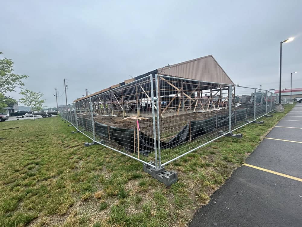 Temporary fencing set up around a construction site