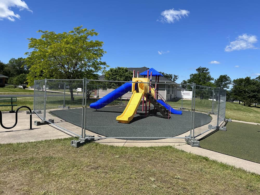 Temp fencing around a playground