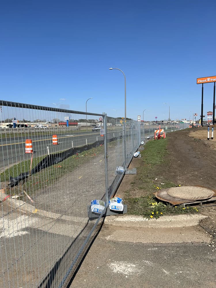 Large Temp fencing set up around Fleet Farm