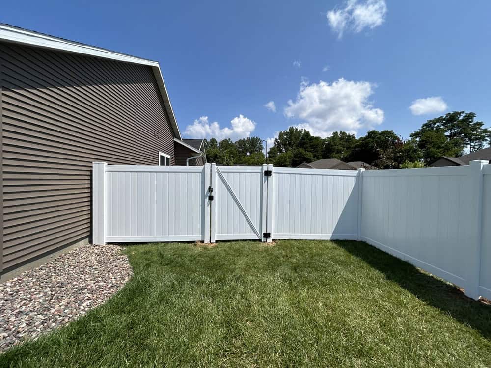 White vinyl fence - residential fence installation