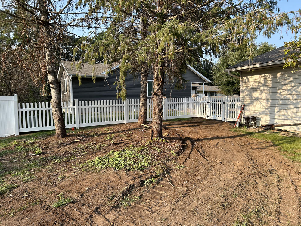 White vinyl picket fence - residential fence installation