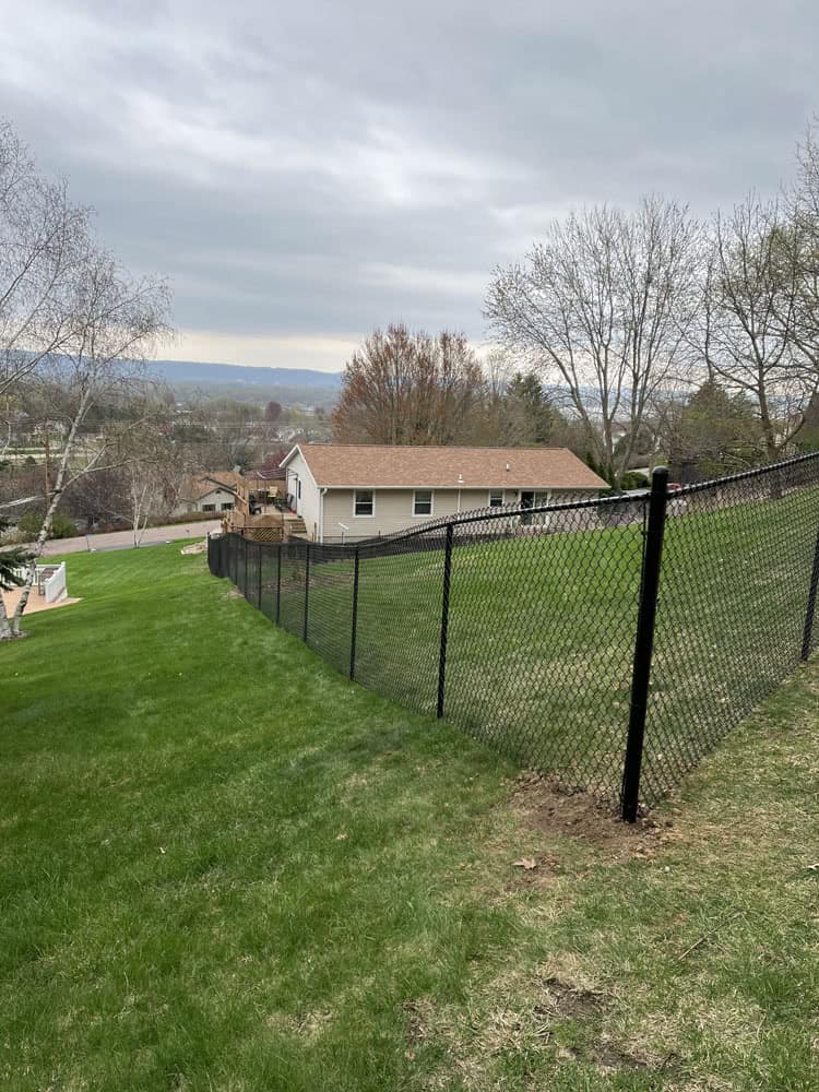 chain link fence install by Flyway Fence Co
