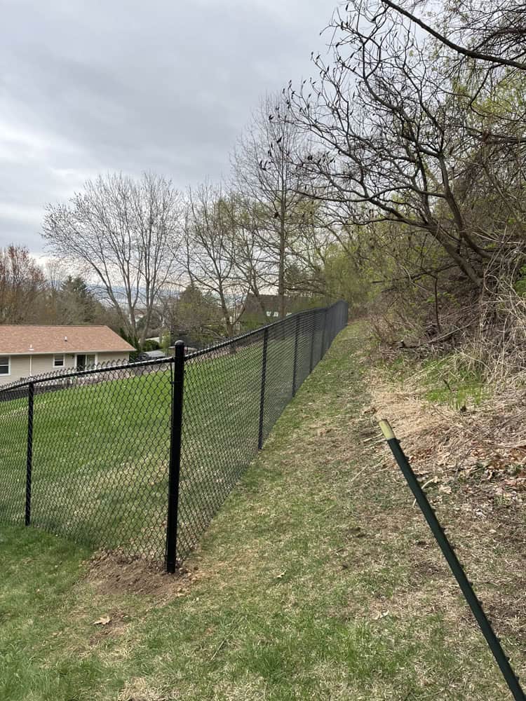 chain link fence install by Flyway Fence Co