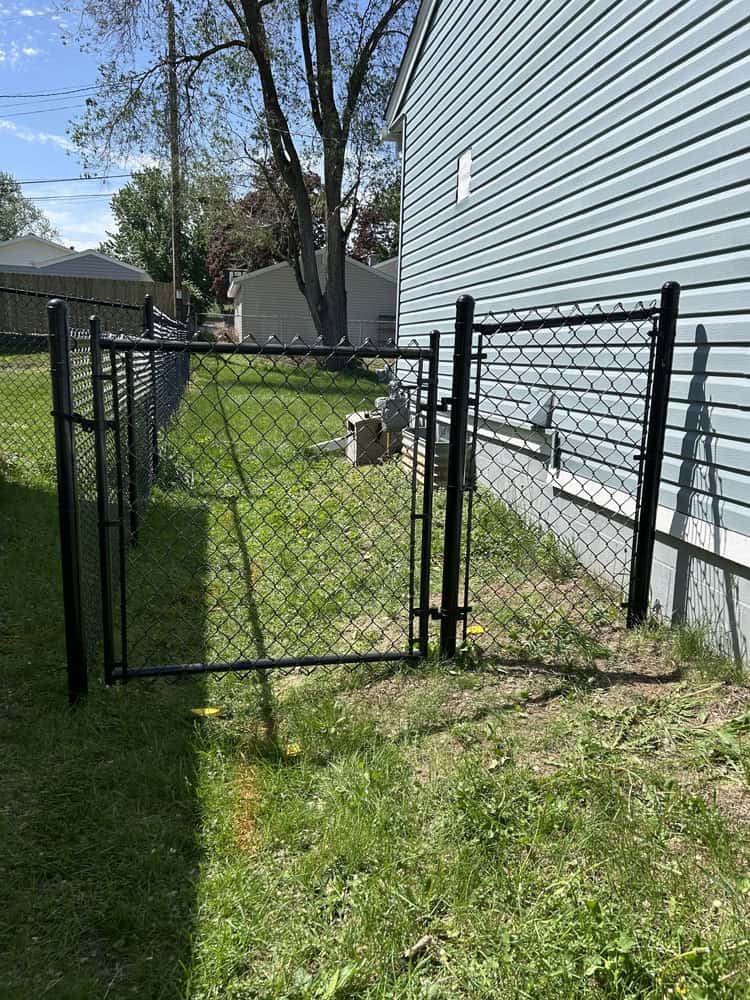 chain link fence gate install by Flyway Fence Co