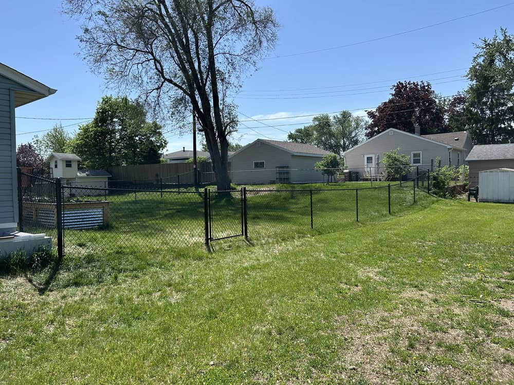 residential chain link fence install by Flyway Fence Co