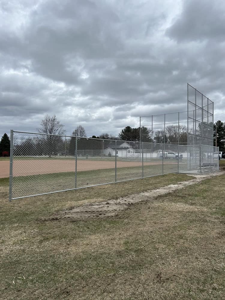 Chain Link fencing installation by Flyway Fence Co - ball park sideline fences