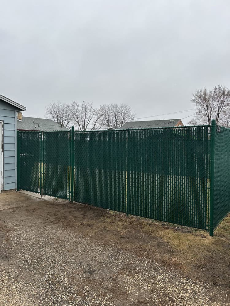 residential chain fence installation with privacy