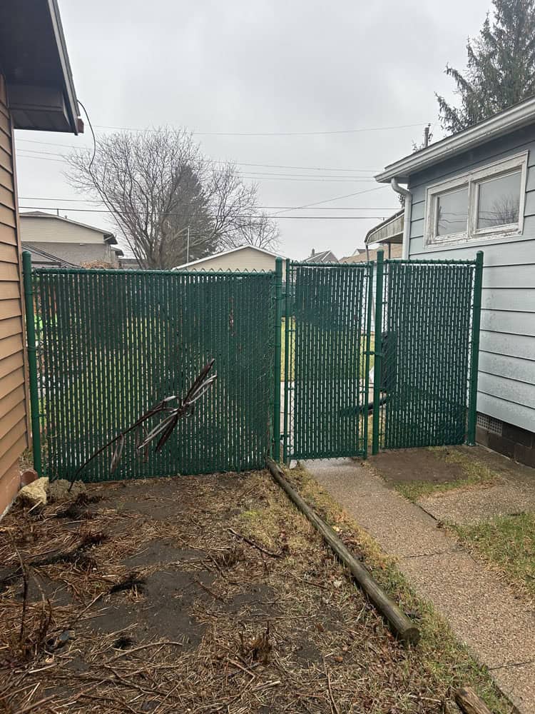 residential chain fence installation with privacy