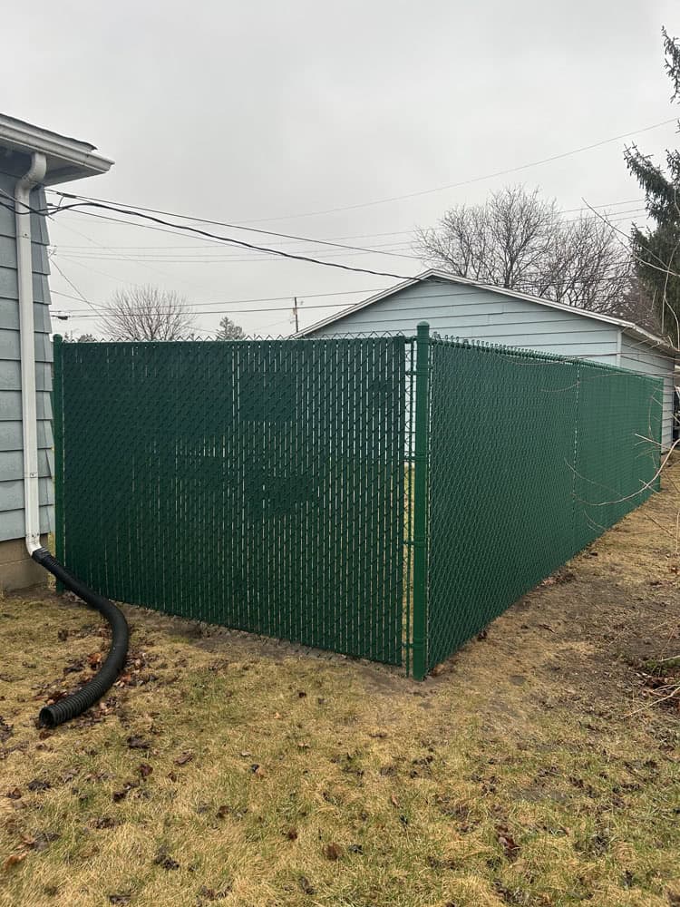 residential chain fence installation with privacy