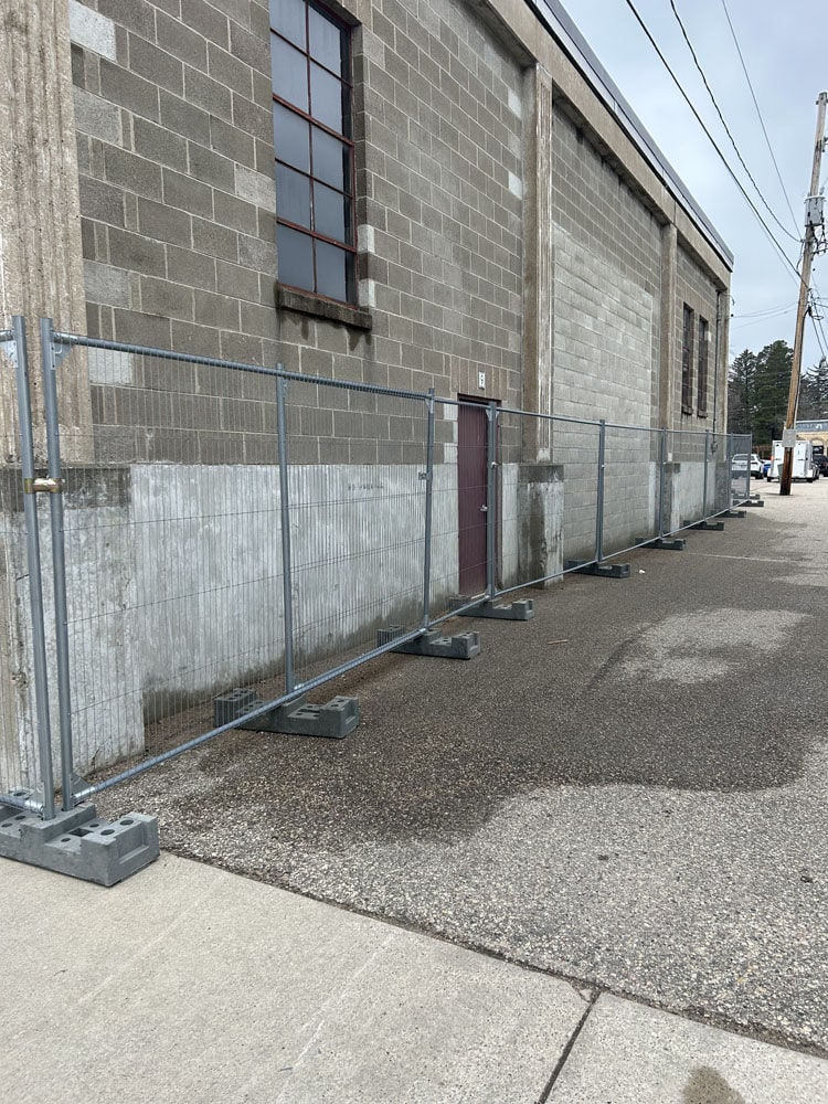 Commercial Temporary Fence Installation by Flyway Fence Co.