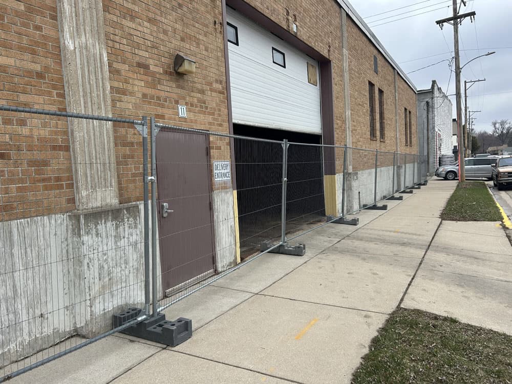 Commercial Temporary Fence Installation by Flyway Fence Co.