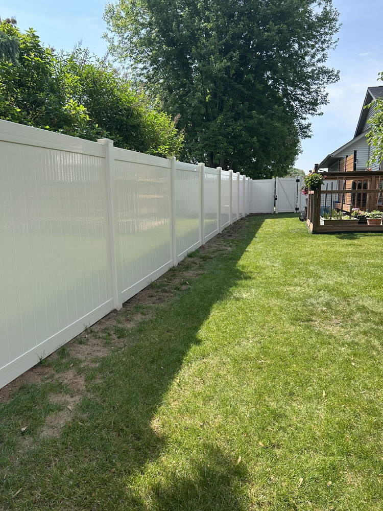 long view of installed vinyl fence